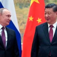 Presidentes da Rússia, Vladimir Putin (E), e China, Xi Jinping, durante reunião em Pequim, em 4 de fevereiro de 2022 (AFP/Alexei Druzhinin) (Alexei Druzhinin)